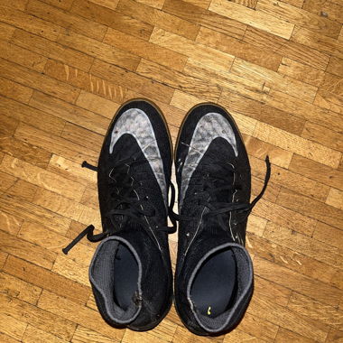 Schwarze Nike-Fussballschuhe