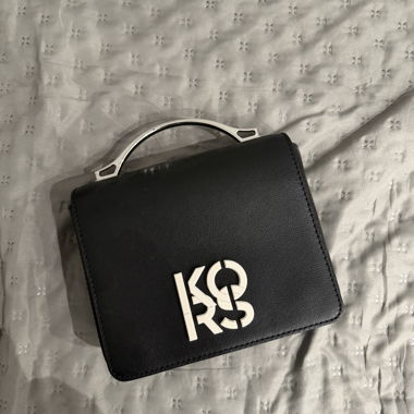 Black bag with Michael Kors shoulder strap
