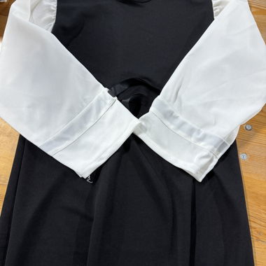 Black dress with white sleeves
