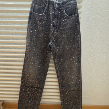 Jeans neri con strass