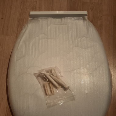 Abattant de WC blanc neuf- avec son emballage 