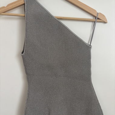 Top asymétrique en maille