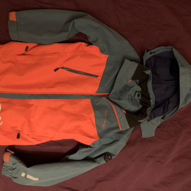 Orange-grey Trevolution outdoor jacket size 140