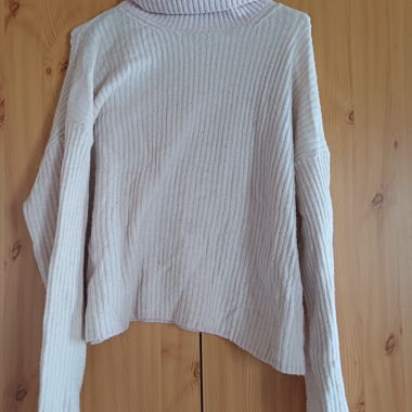 Maglione dolcevita rosa chiaro
