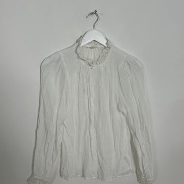 Blusa bianca con colletto in pizzo