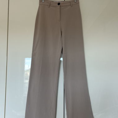Pantaloni beige a gamba larga