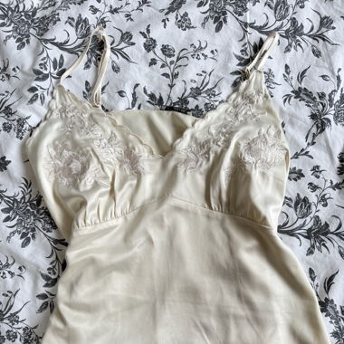 Butter yellow slip top with embroidered flowers