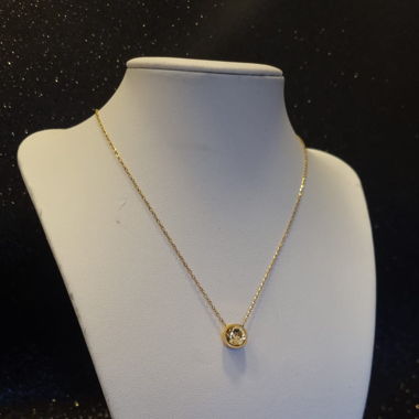 Collana dorata con pietra gialla