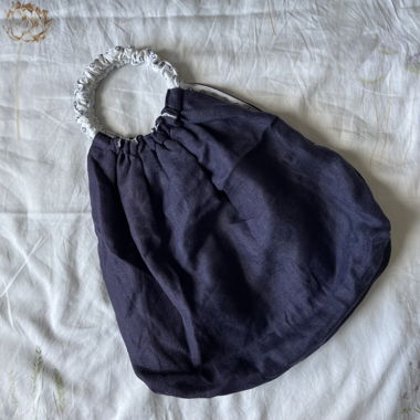 Borsa in tessuto con manico ad anello