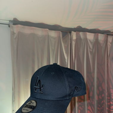 New Era cap.
