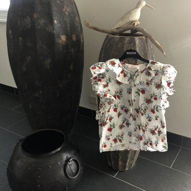 Blumiges Top und See By Chloé-Logo