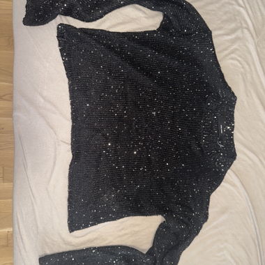 Schwarzer Pailletten-Pullover