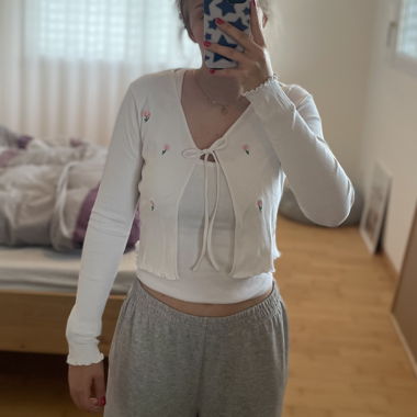 Top cardigan floreale bianco