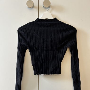 Schwarzes langarm Top
