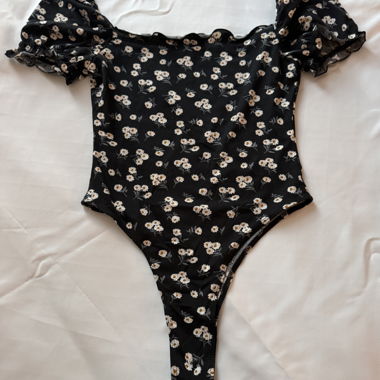 Body floreale con maniche a sbuffo