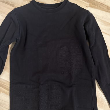 Maglia nera a maniche lunghe