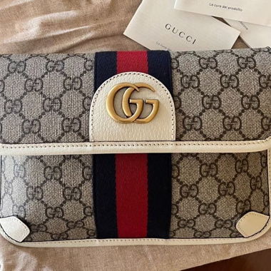 Gucci GG Canvas Gürteltasche mit Lederdetails