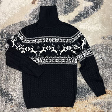 Dark blue turtleneck sweater with white reindeer pattern