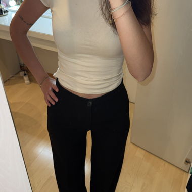 Pantaloni in tessuto neri con bottone senza tasche