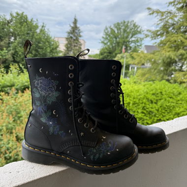 Black lace-up combat boots