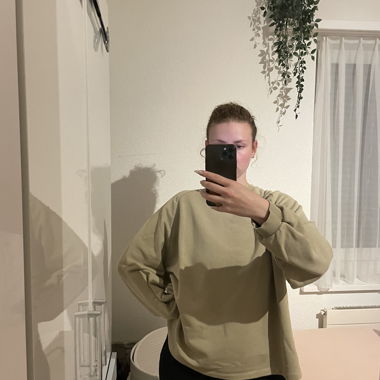 green sweater