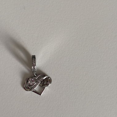 Set of 3 unbranded charms 