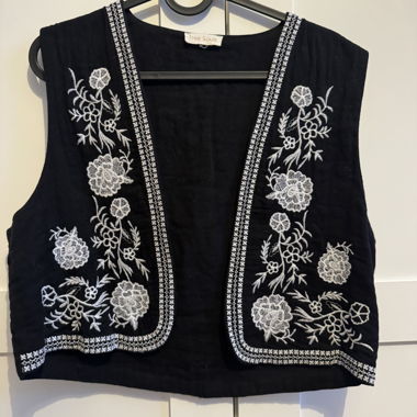 Embroidered black vest