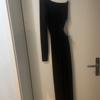 Robe de réveillon pailletée avec fente à la hanche