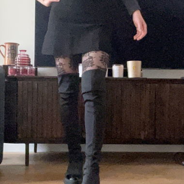 Black two‑material over‑the‑knee boots