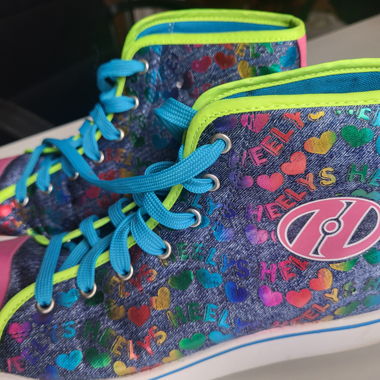 HEELY'S Bunte High-Top-Sneaker mit Rollen