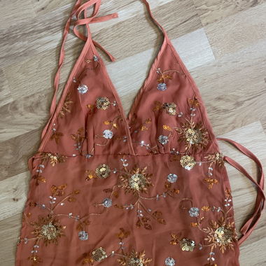 Orange backless top