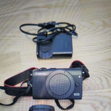 Canon M100 