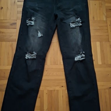 Jeans neri strappati