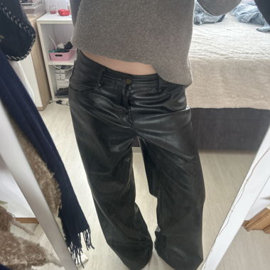 Black faux-leather trousers