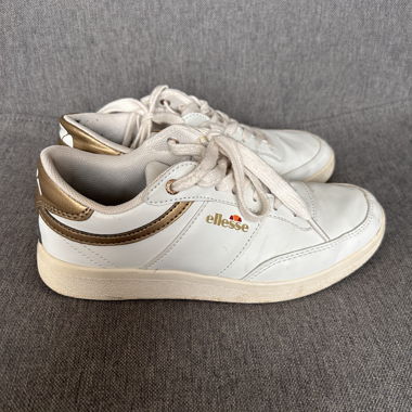 White and gold ellesse sneakers