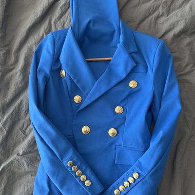 Blue blazer and trousers with gold buttons