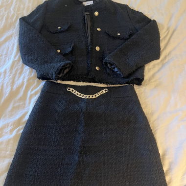 Set in tweed nero a due pezzi
