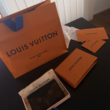 Louis Vuitton cardholder with receipt