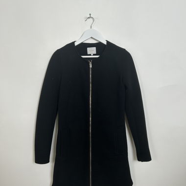 Manteau noir à fermeture éclair