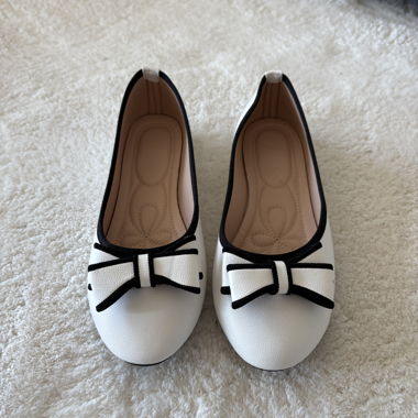 Ballerine bianche con fiocco