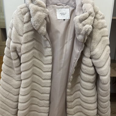 Manteau fausse fourrure beige
