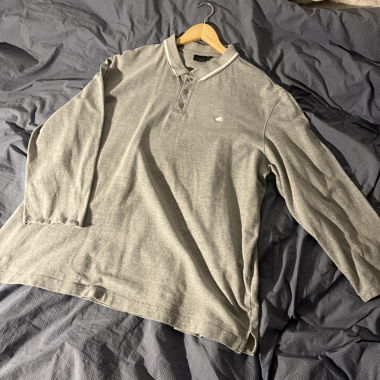 Polo grigio a maniche lunghe