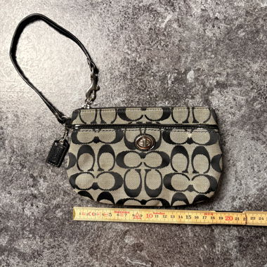 Coach Signature-Täschchen