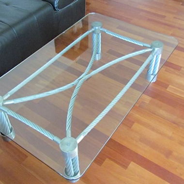 Table basse en verre avec câbles de télécabine de Moléson