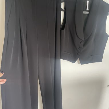 Set nero con pantaloni e gilet