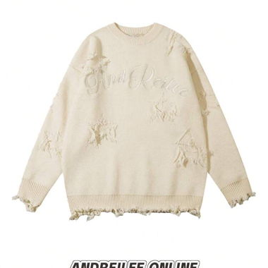 Maglione crema effetto usurato ricamato