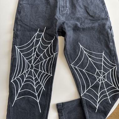 Jeans noir motif toile