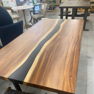 Rustic walnut wood and epoxy resin dining table