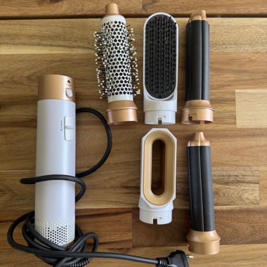 Hair styler/hair dryer with various attachments