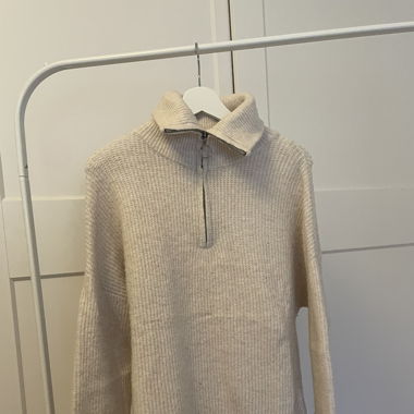 Pull blanc/crème en maille 